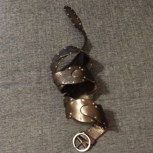 Leather Belt with silver gromlets.